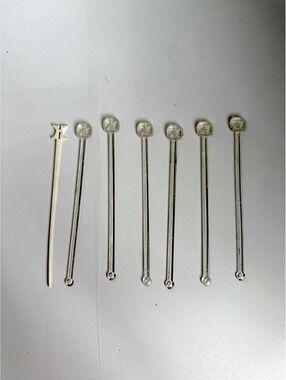 Set of 7 Vintage Clear Plastic Hilton Swizzle Sticks